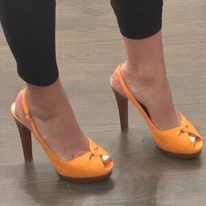Stuart Weitzman orange leather sandals with platform
